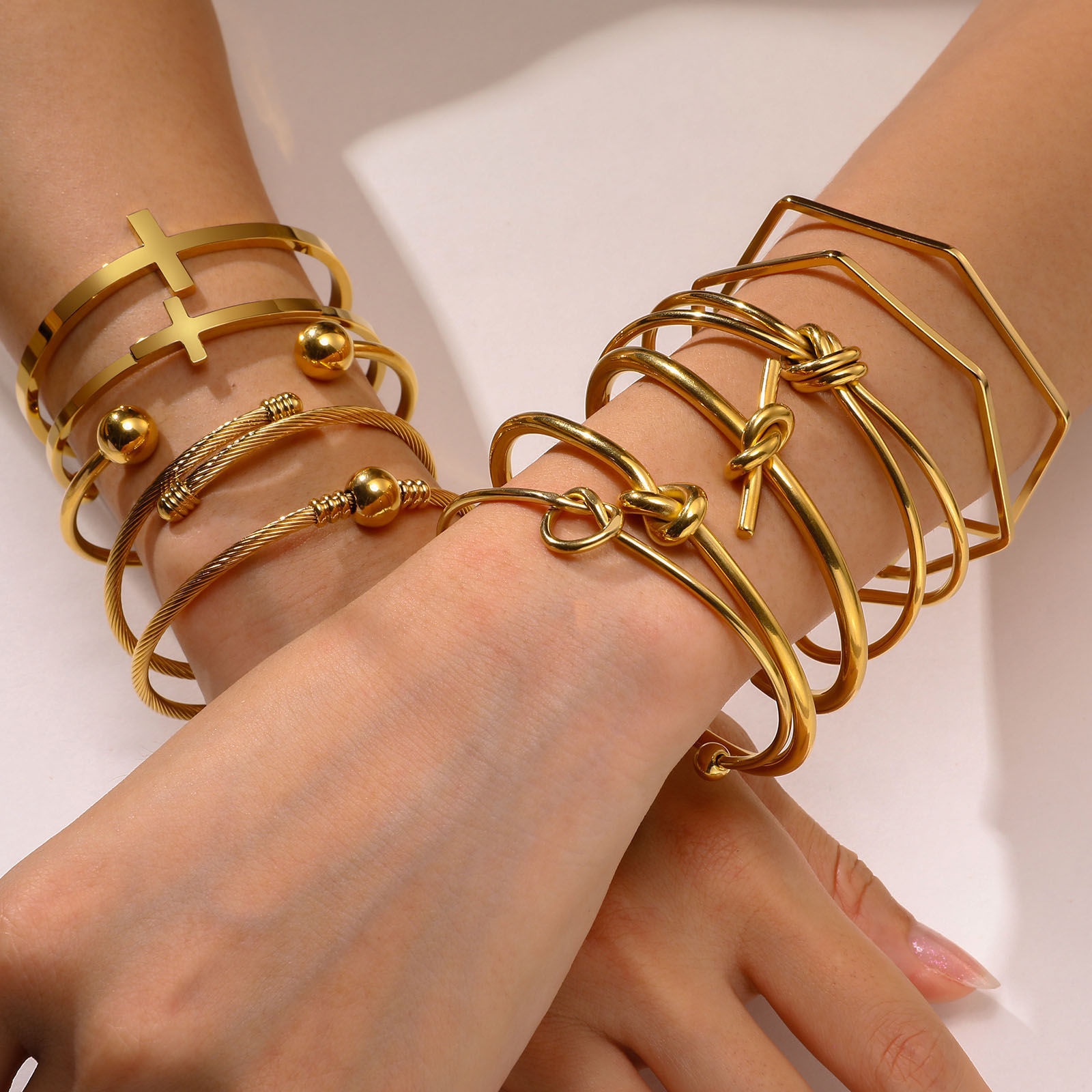 Picture of Eco-friendly Vacuum Plating Stylish Simple 18K Gold Plated 304 Stainless Steel Knot Cross Open Bangles Bracelets For Women Party