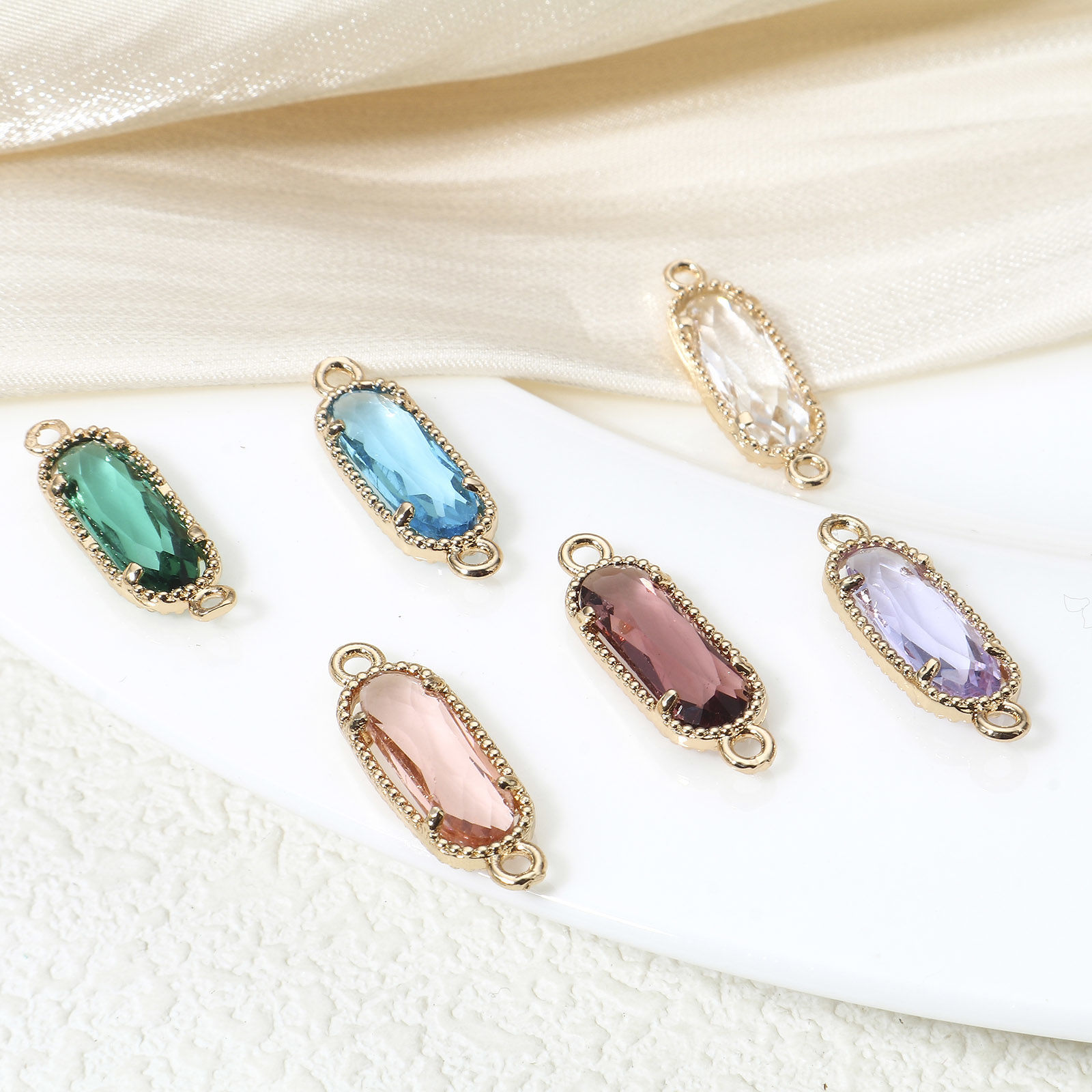 5 個 真鍮 コネクター ペンダント チャーム 金メッキ 多色 楕円形 ガラスカボション付き 22mm x 7mm の画像