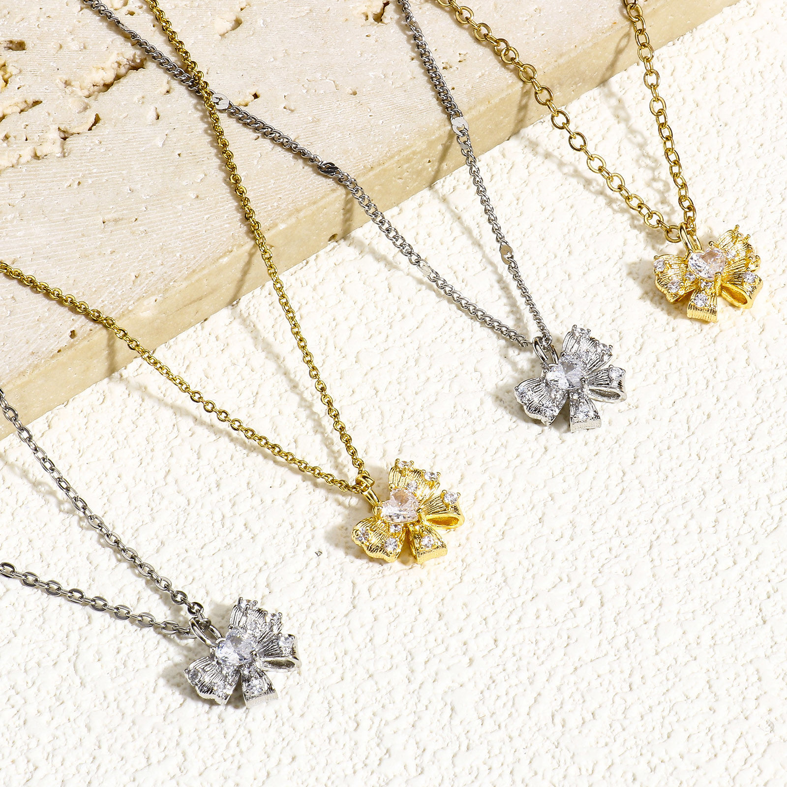 Picture of Eco-friendly Brass Clothes Charms Real Gold Plated Bowknot Micro Pave Clear Cubic Zirconia 13mm x 12mm