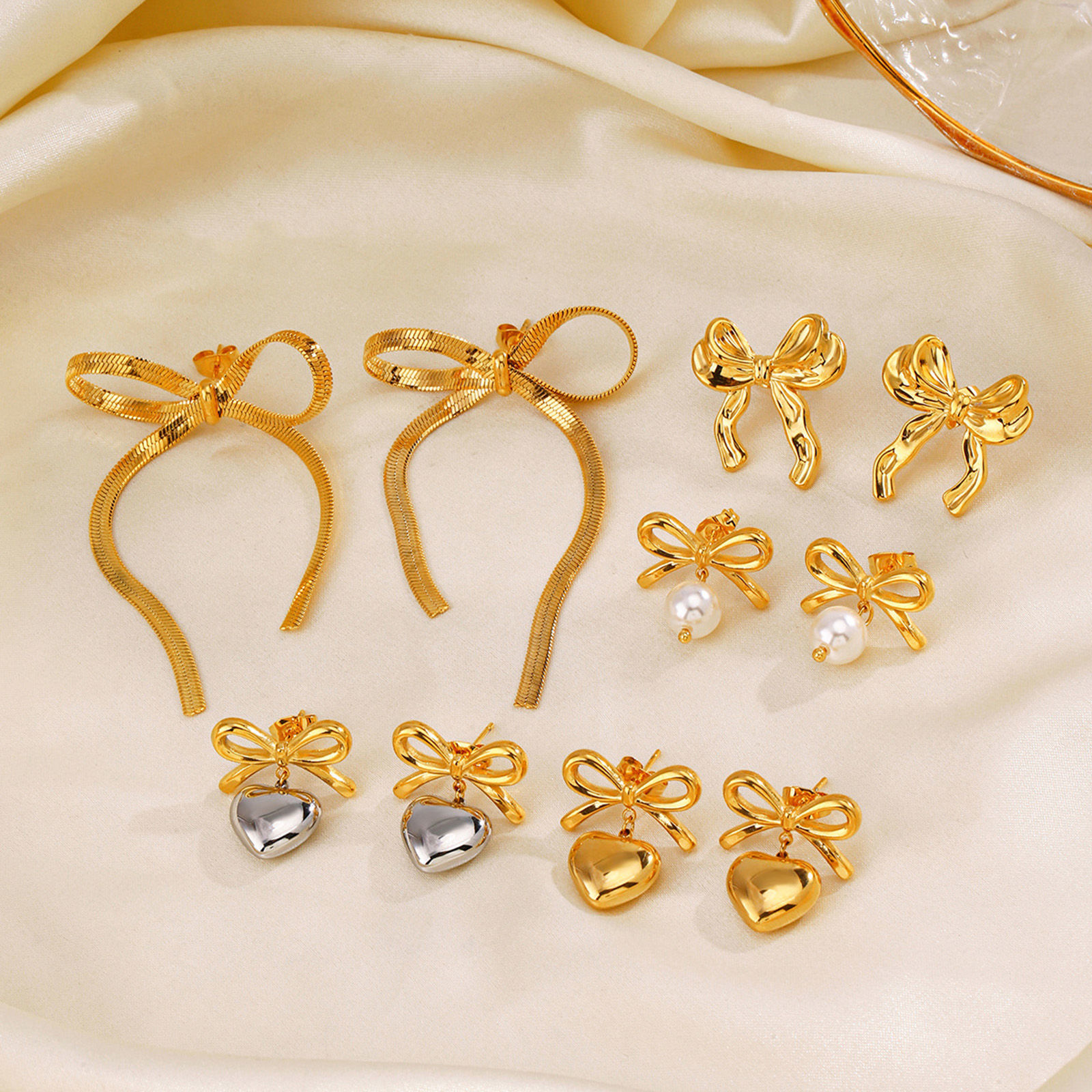 Picture of Eco-friendly Vacuum Plating Stylish Ins Style 18K Gold Plated 304 Stainless Steel Bowknot Heart Earrings For Women Party
