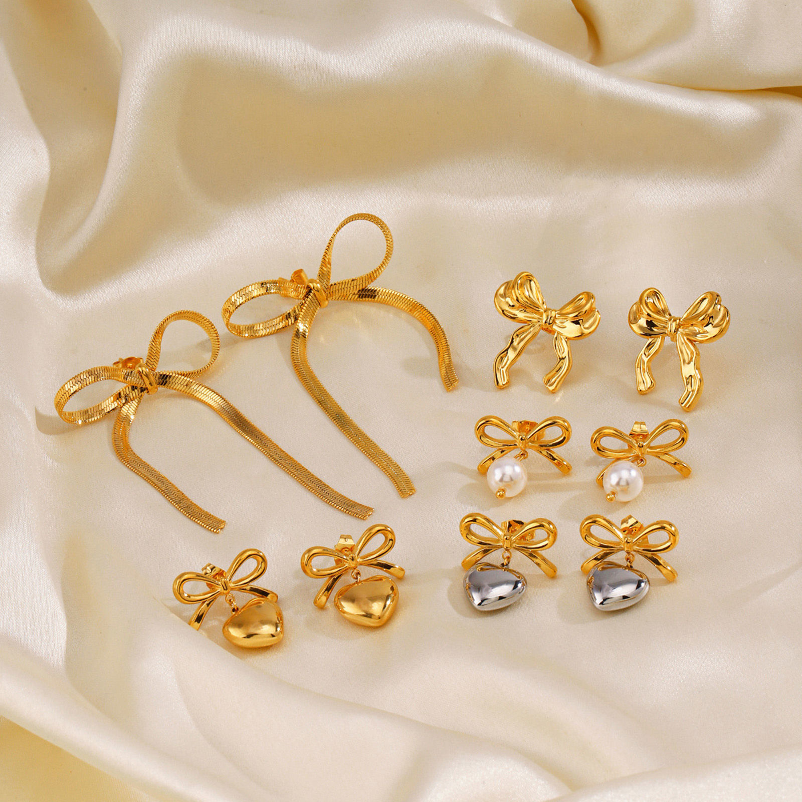 Picture of Eco-friendly Vacuum Plating Stylish Ins Style 18K Gold Plated 304 Stainless Steel Bowknot Heart Earrings For Women Party