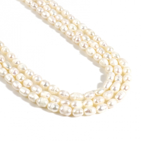 Picture of Natural Freshwater Cultured Pearl Baroque Beads Oval White About 9x5.5mm - 6x4.5mm, Hole: Approx 0.6mm, 35cm(13 6/8") long, 1 Strand (Approx 54 PCs/Strand)
