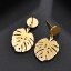 Immagine di 304 Acciaio Inossidabile Elegante Orecchini a Perno Placcato Oro 18K Foglia di Monstera Filigrana 28mm x 16mm, Posta / Filo Dimensione: (20 misura), 1 Paio
