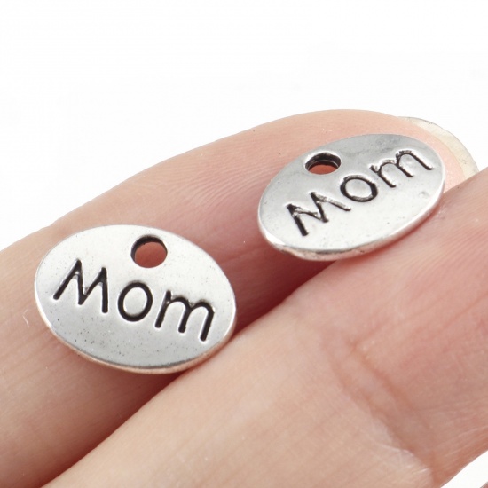 Picture of Zinc Based Alloy Mother's Day Charms Antique Silver Color Oval Message " Mom " 12mm x 9mm, 50 PCs