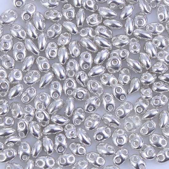 Image de (Japon Importation) Perles de Rocailles à Deux Trous en Verre Argent Métallique Env. 5mm x 4mm - 5mm x3mm, Trou: Env 0.5mm, 10 Grammes (Env. 17 Pcs/Gramme)