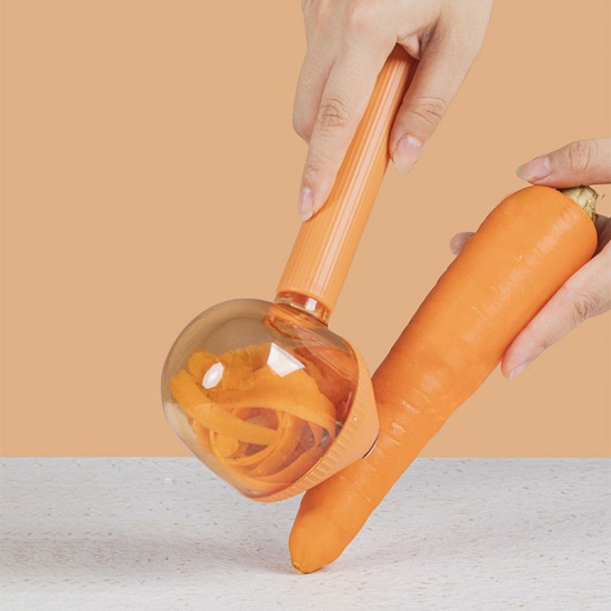 Immagine di Orange - PP Fruit Skin-Peeler Kitchen Tools With Peel Storage Box 21x7.8x14cm, 1 Piece
