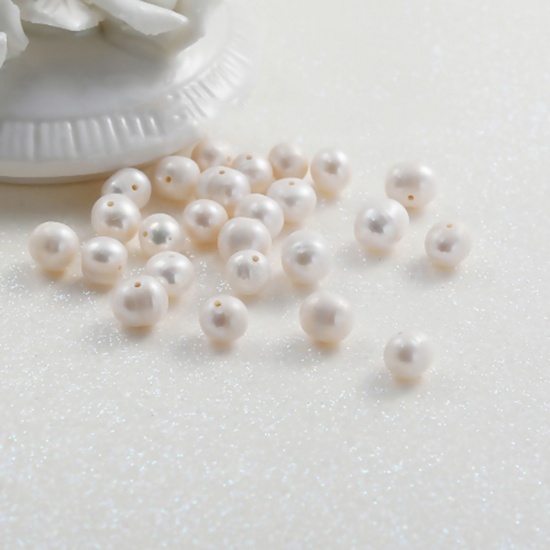 淡水真珠 ビーズ 円形 白 約 8mm - 7mm、 穴：約 0.7mm 10 個 の画像
