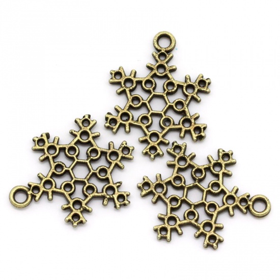 Picture of Zinc Metal Alloy Christmas Charm Pendants Snowflake Antique Bronze Hollow 22.5mm x 17mm( 7/8"x 5/8"), 50 PCs