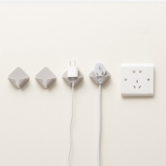 Immagine di Beige - Punch-free Self-adhesive Wall-mounted Plug Power Cord Storage Rack 4.6x4.6cm, 1 Packet(2 PCs/Packet)