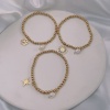 Bild von Umweltfreundlich Elegant Einfach 18K Gold plattiert 304 Edelstahl & Naturperle Halbmond Schmetterling Elastisch Charm-Armbänder Für Frauen Jubiläum 1 Strang