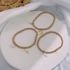 Bild von Umweltfreundlich Elegant Einfach 18K Gold plattiert 304 Edelstahl & Naturperle Halbmond Schmetterling Elastisch Charm-Armbänder Für Frauen Jubiläum 1 Strang