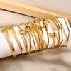Picture of Eco-friendly Vacuum Plating Stylish Simple 18K Gold Plated 304 Stainless Steel Knot Cross Open Bangles Bracelets For Women Party