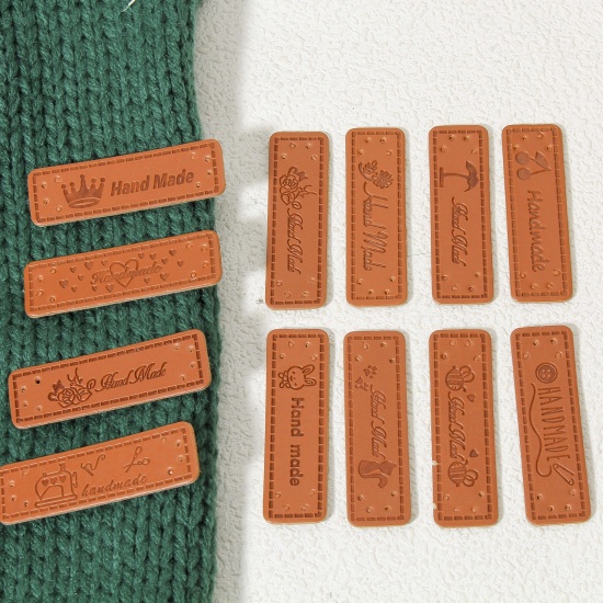 Immagine di 50 Pz PU Etichetta Etichetta per Abbigliamento Rettangolo Marrone " Hand Made " 5cm x 1.5cm