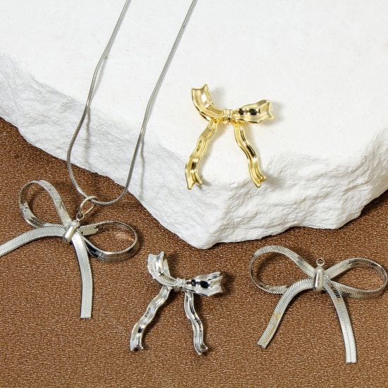 Picture of Eco-friendly Brass Clothes Charms Real Gold Plated Bowknot 3D