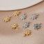 Bild von Messing Galaxis Charms Sonne 12mm x 10mm